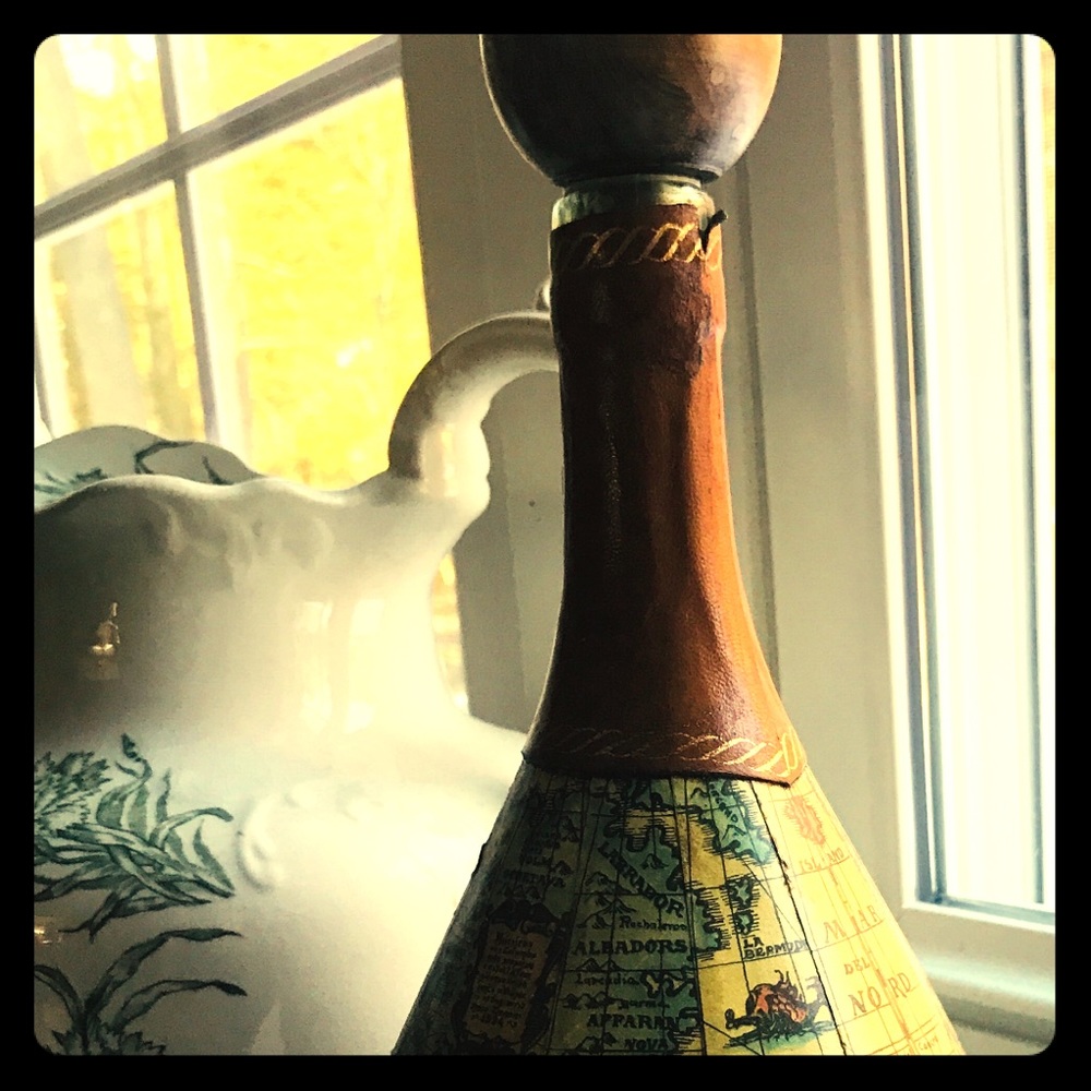 Vintage leather bound glass decanter